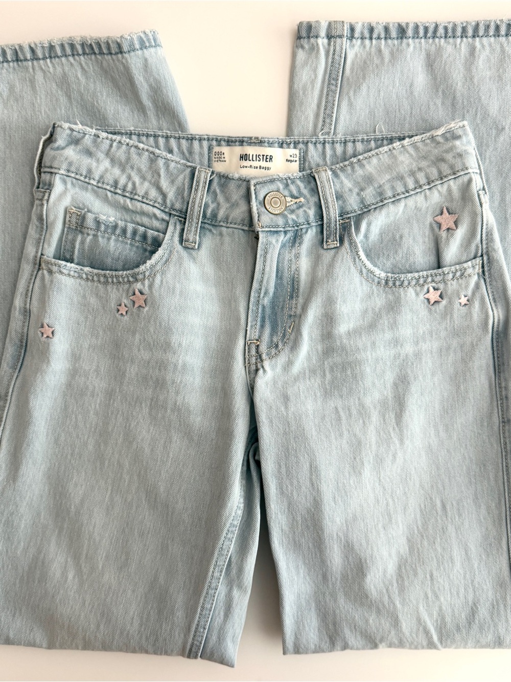 EUC Hollister Low-Rise Baggy Light Blue with Pink Stars Jeans